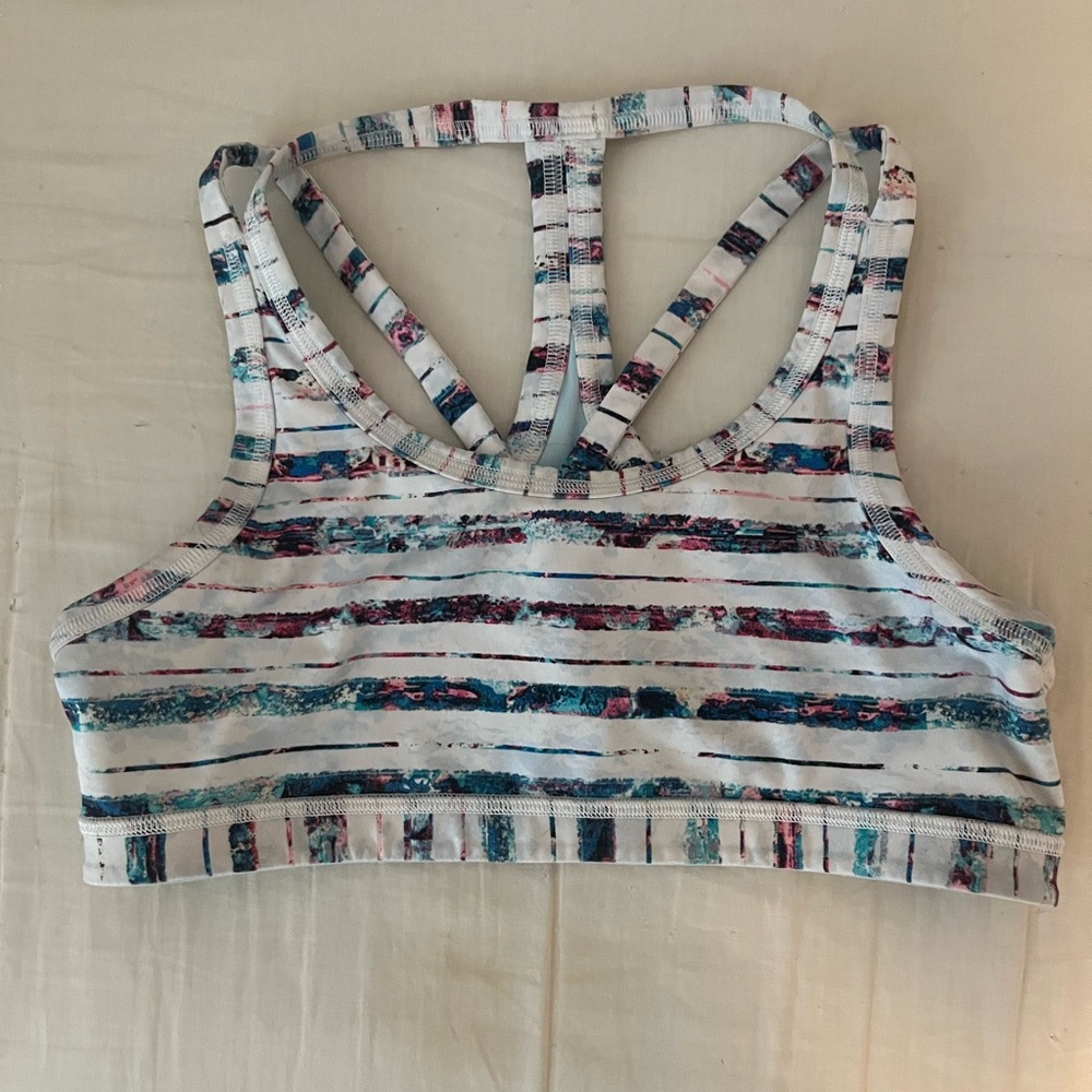 Reverseable blue and rainbow striped ivivva sports bra
